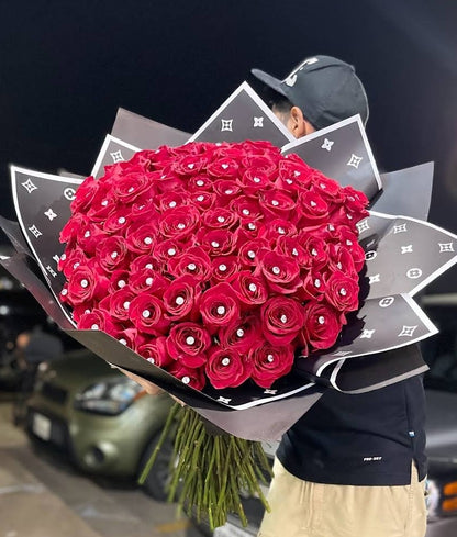 roses wrapped in paper –  Illusion Flower Shop, Houston TX
